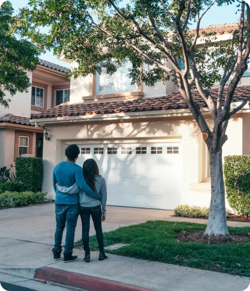 Two people at a house